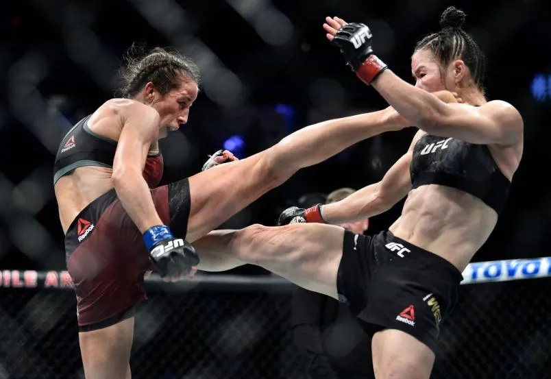 Joanna Jedrzejczyk of Poland kicks Zhang Weili of China in their UFC strawweight championship fight during the UFC 248 event at T-Mobile Arena on March 07, 2020 in Las Vegas, Nevada. (Photo by Chris Unger/Zuffa LLC)