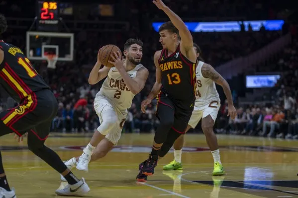 De'Andre Hunter scores 23 points as the Hawks beat the NBA-best Cavs again,  117-101 | AP News