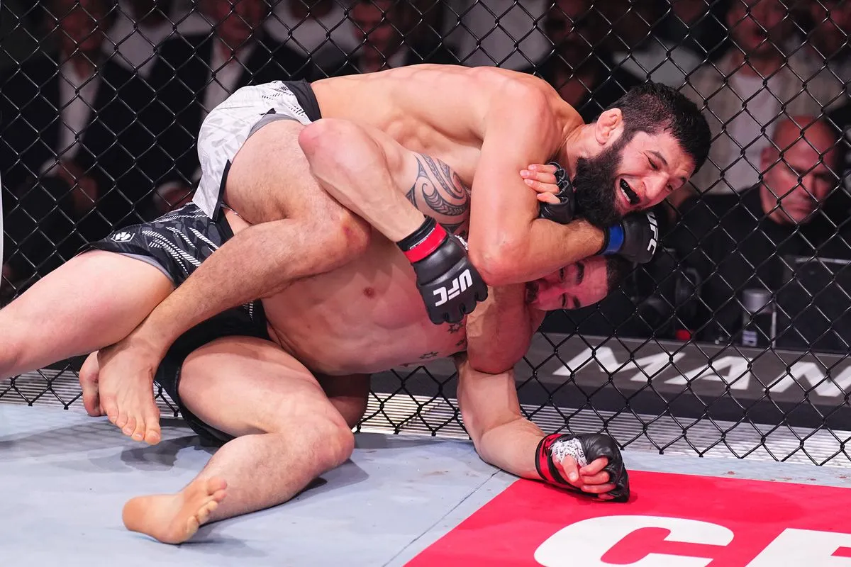 UFC 308 results: Khamzat Chimaev crushes Robert Whittaker's jaw for nasty  first-round submission win - MMA Fighting