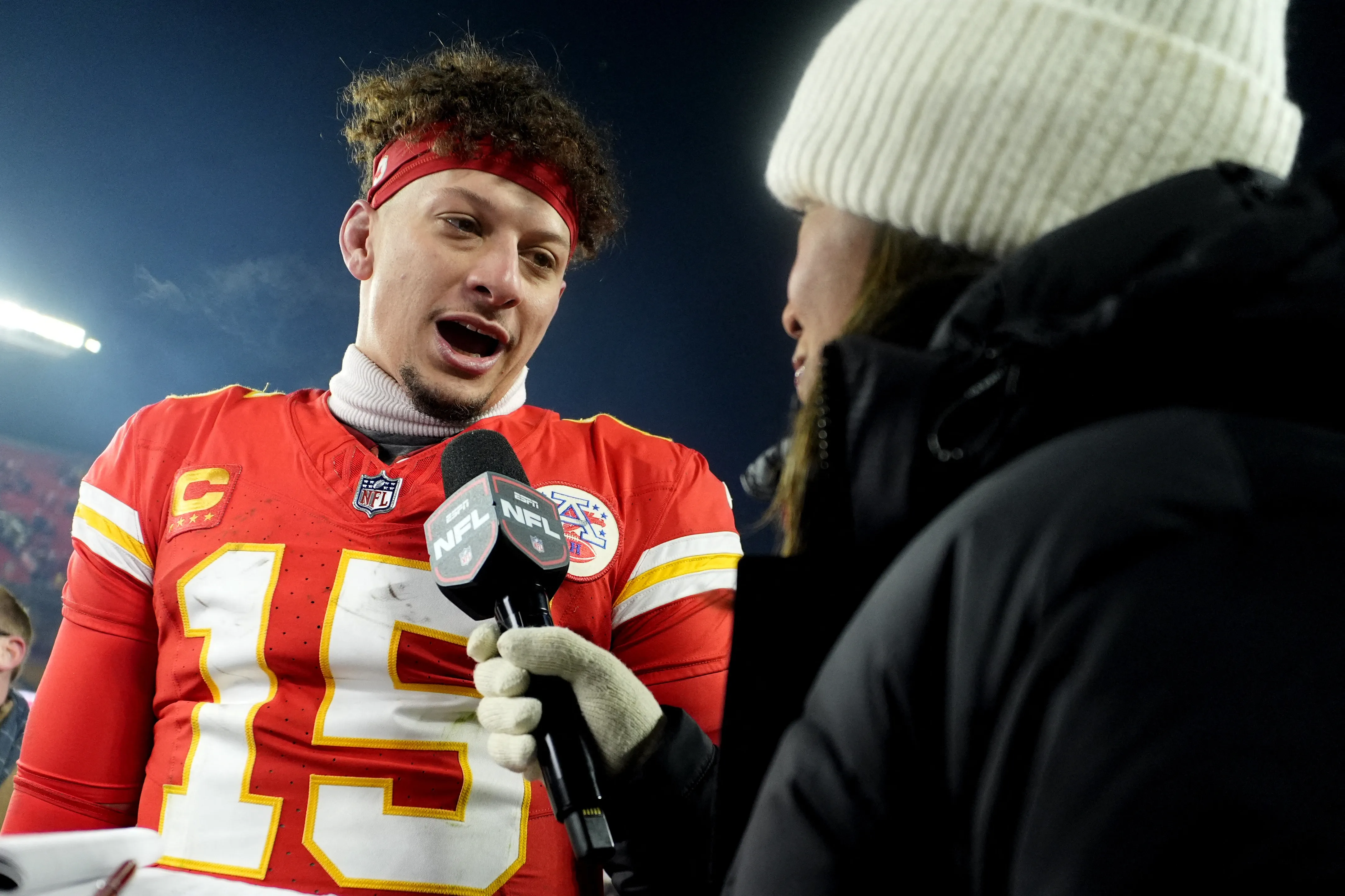 Patrick Mahomes talking to a reporter in 2025.