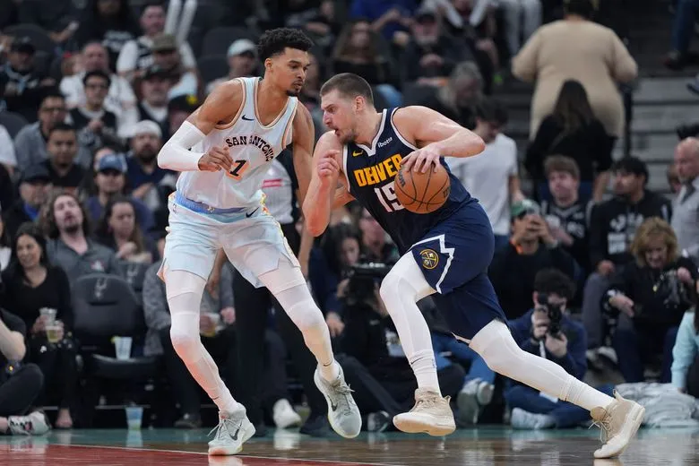 Nuggets center Nikola Jokic sidelined for game against Celtics due to  illness | The Seattle Times