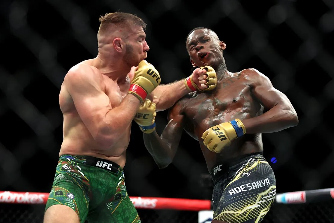 Dricus du Plessis retains UFC middleweight belt against Israel Adesanya,  who touted Africa as the winner | CNN