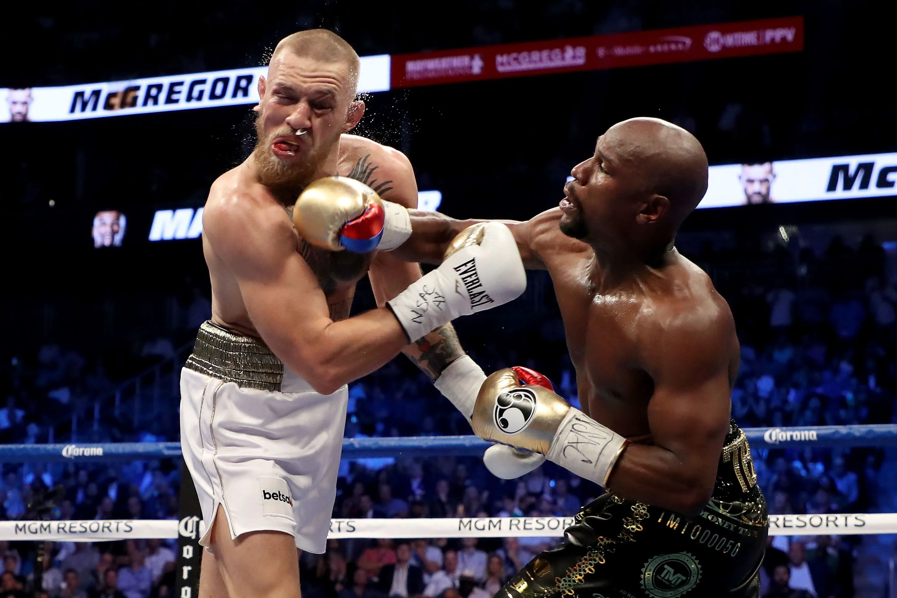 Mayweather defeats McGregor by TKO